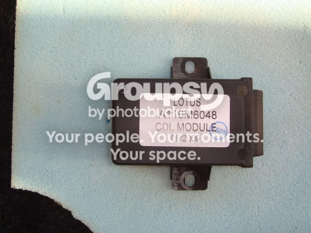The CDL module with a white label reading Lotus A116M6048 CDL Module 08/2009