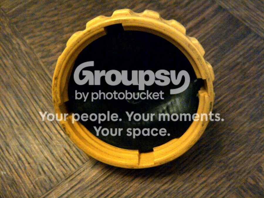 A yellow coolant cap with its rubber seal removed and notches cut
