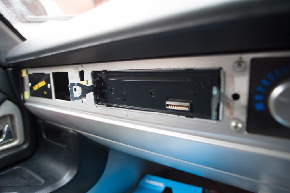The release keys inserted either side of the head unit