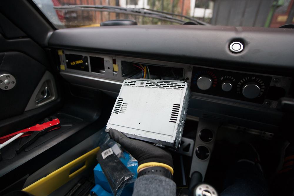 The head unit slid out with its cables still attached