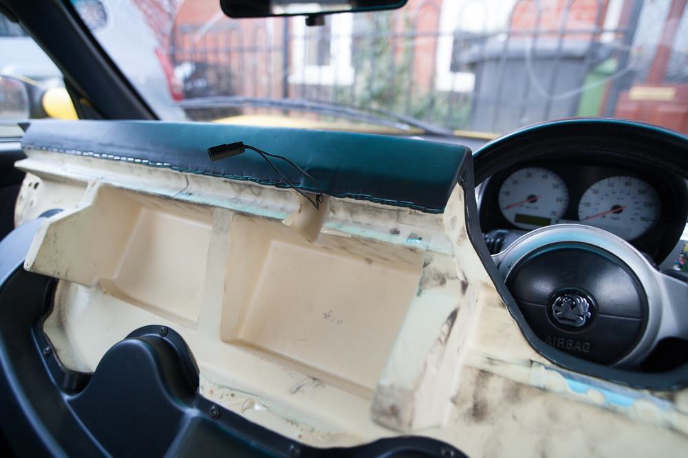 Another view of the starter button wires behind the dash
