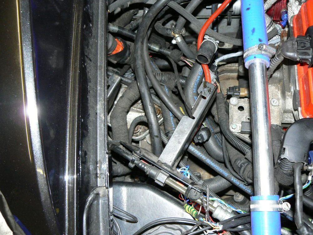 The engine bay seen from the passenger side