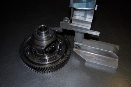The old open diff standing on a surface plate beside a vernier height gauge
