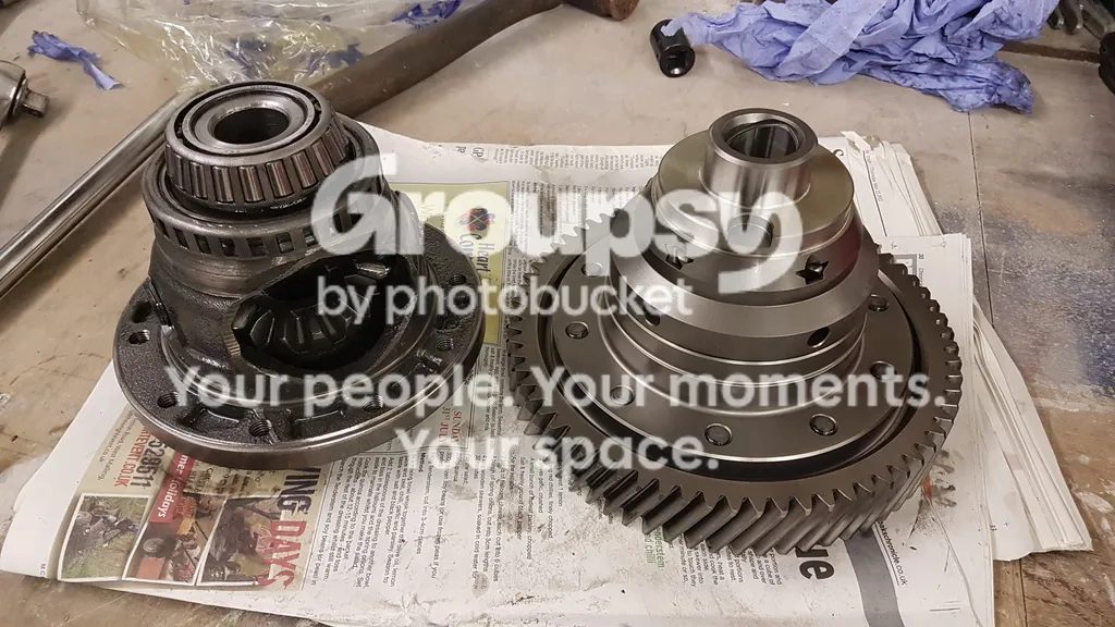 The old diff with its bearing beside the new diff with the crown ring fitted