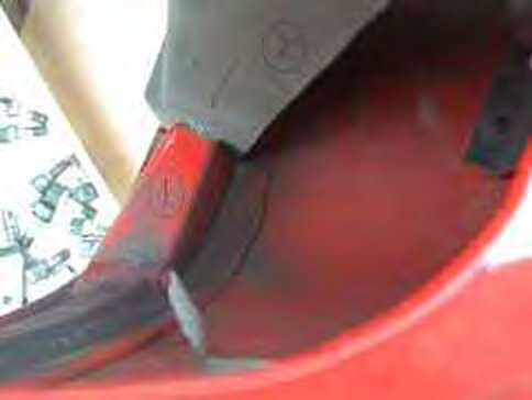 View down through the headlamp aperture to the bolt