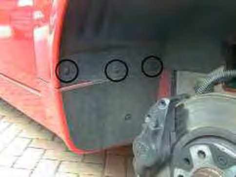 Three circled screws in the offside inner arch