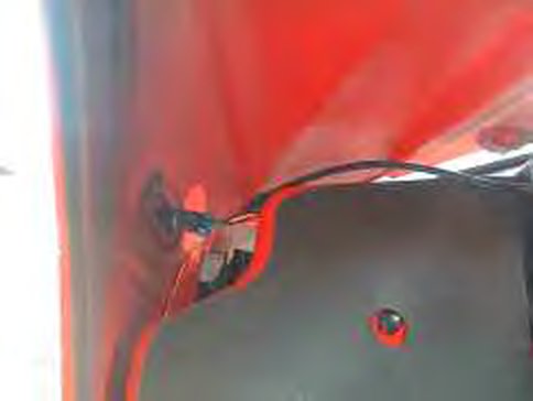 Indicator repeater wires at the rear of the wheel arch