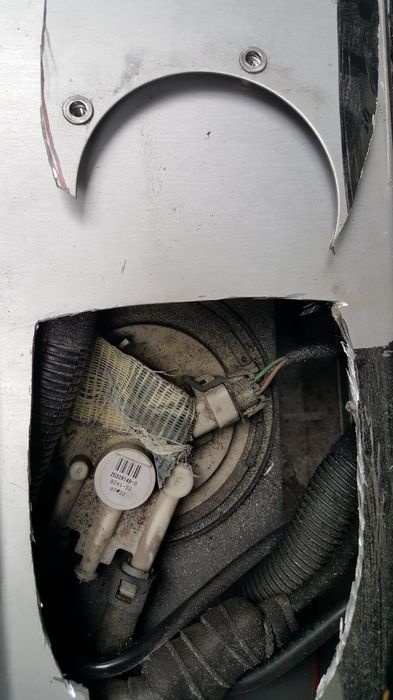 Close-up of the open hatch showing the pump housing
