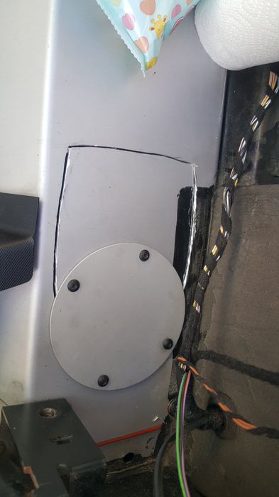 Round inspection cover fitted over the cut line