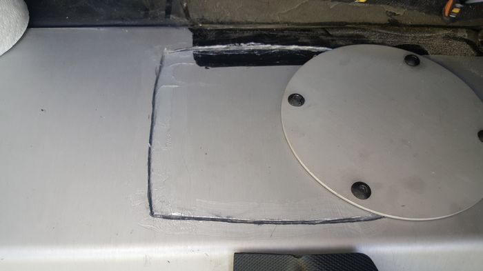 Refitted plate with silicone bead along the cut line