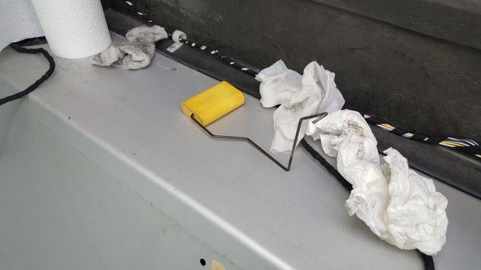The fuel sender float arm on a rag on the panel