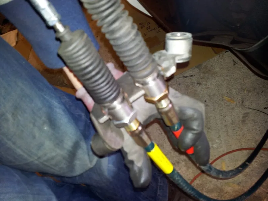 The new cables with their boots and the cable bracket