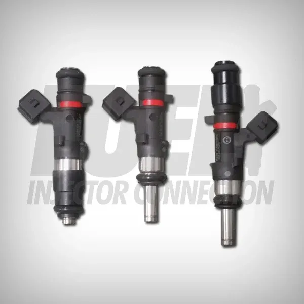 Three Bosch EV14 injectors side by side with different adaptor sections and tip lengths