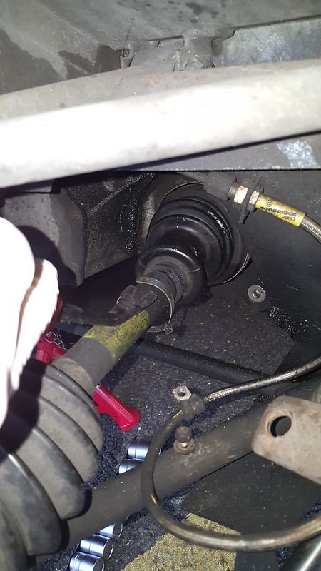 The old boot pulled back from the CV joint