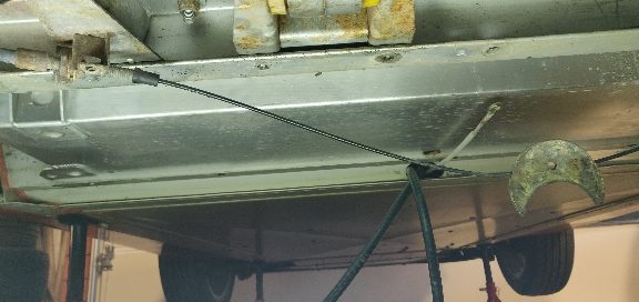 Handbrake cable and compensator end