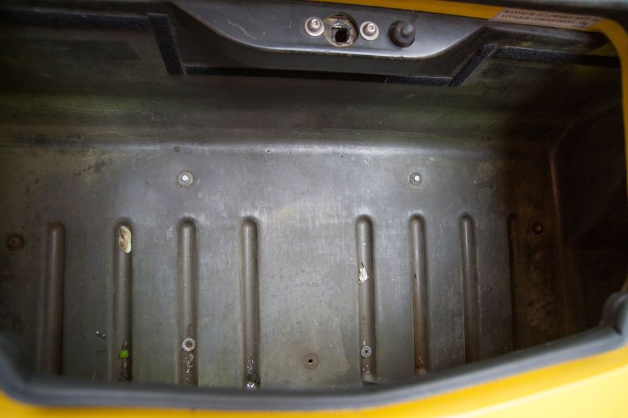 The boot floor and its four bolts