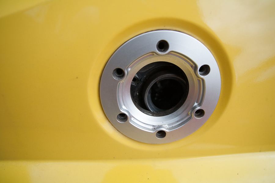 The fuel filler with its six-screw alloy surround