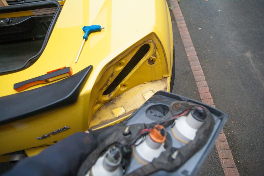 A rear light unit being removed