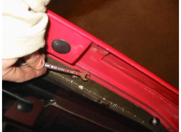 The row of bolts under the third brake light