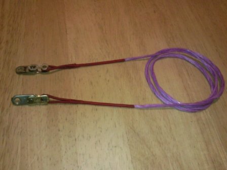 A long loop of purple string with a red whipped end on each side, each attached to a countersunk plate with a chain split link